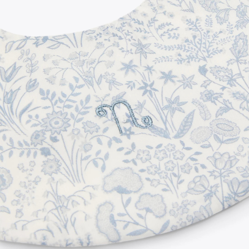 Bavaglino avorio in jersey azzurro