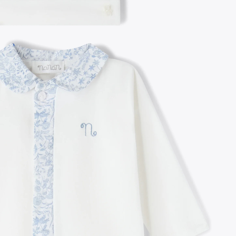 Tutina e berretta avorio in jersey azzurro